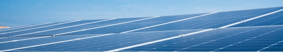 Solar panels under a clear blue sky